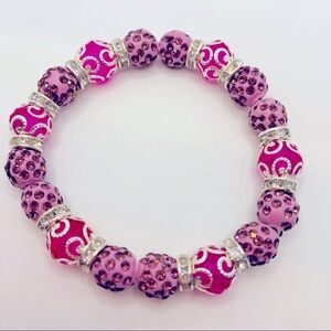 Bracelet Crystal Purple and Magenta with silver colored beads through ou…